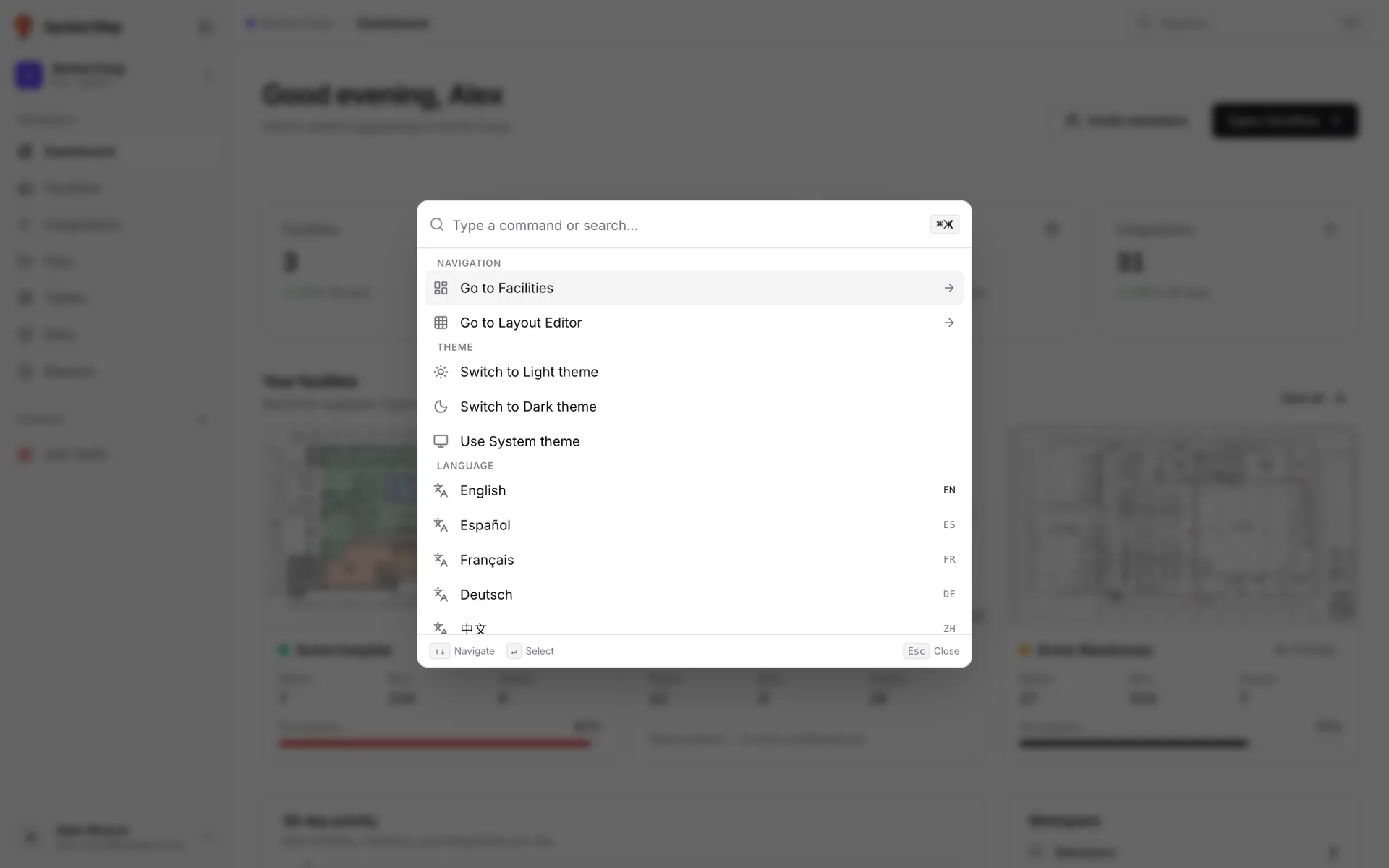 Command palette open over the Dashboard with a "Type a command or search…" field and three groups: Navigation (Go to Facilities, Go to Layout Editor), Theme (Switch to Light theme, Switch to Dark theme, Use System theme) and Language (English, Español, Français, Deutsch, 中文)