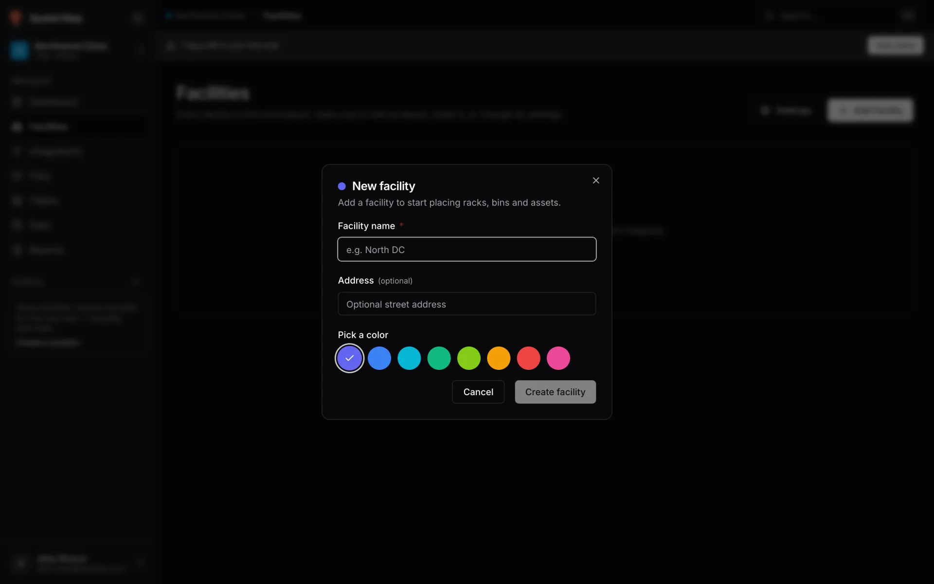 New facility dialog with an empty Facility name field (placeholder e.g. North DC), an optional Address field, eight colour swatches under Pick a color with violet selected, and Cancel and Create facility buttons