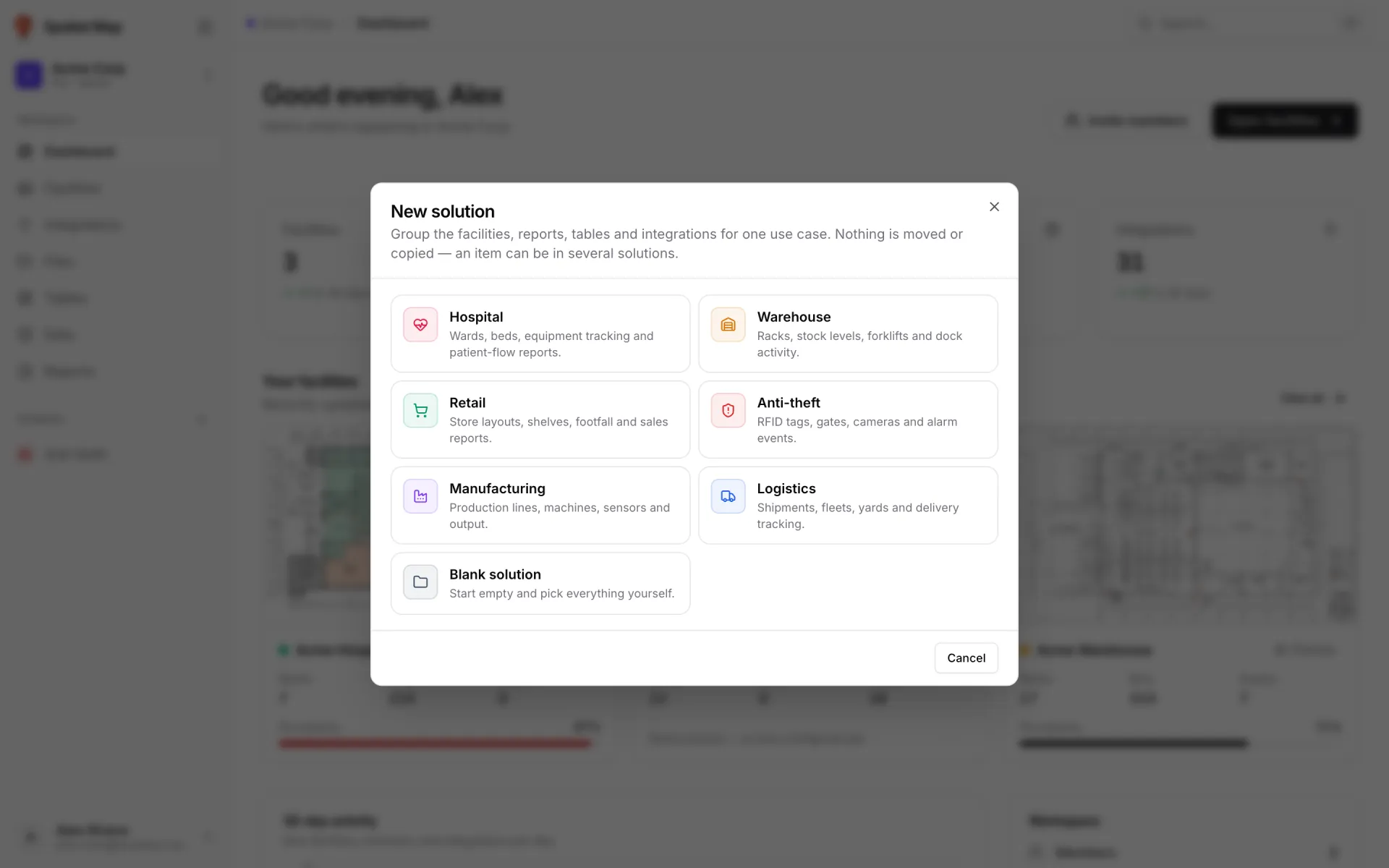 New solution dialog over the Dashboard: "Group the facilities, reports, tables and integrations for one use case. Nothing is moved or copied — an item can be in several solutions." above seven template cards, among them Warehouse, Retail, Anti-theft, Manufacturing, Logistics and Blank solution
